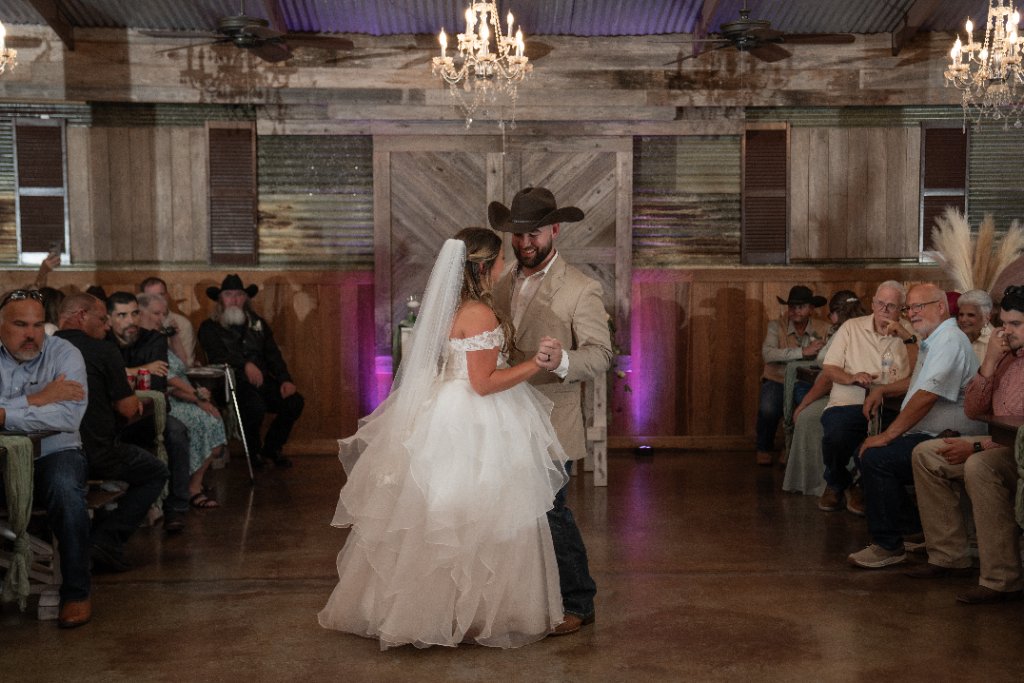 private ranch estate wedding venue in houston tx Wedding reception inside The Barn at Four Pines Ranch